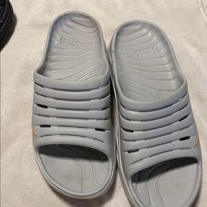 Hoka Light Gray Slip-On Slide Sandals with Small Yellow Accent